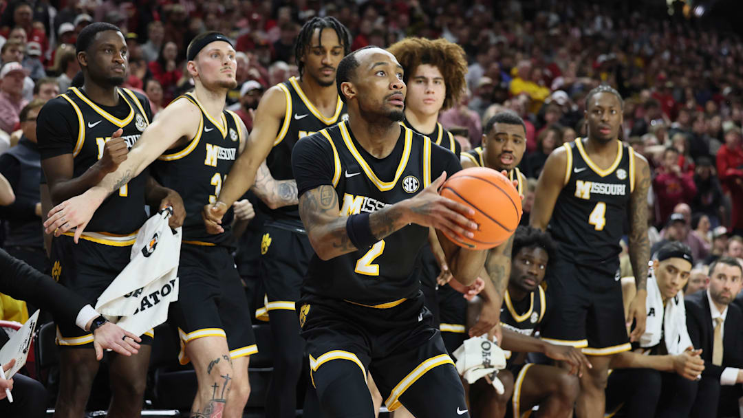 Feb 22, 2025; Fayetteville, Arkansas, USA; Missouri Tigers guard Tamar Bates (2) sets to shoot a three-point shot in the second half against the Arkansas Razorbacks at Bud Walton Arena. Mandatory Credit: Nelson Chenault-Imagn Images