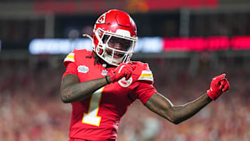 Kansas City Chiefs wide receiver Xavier Worthy celebrates after scoring a touchdown.