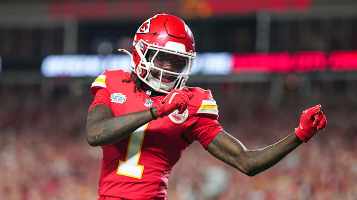 Sep 5, 2024; Kansas City, Missouri, USA; Kansas City Chiefs wide receiver Xavier Worthy (1) celebrates after scoring a touchdown during the second half against the Baltimore Ravens at GEHA Field at Arrowhead Stadium. 