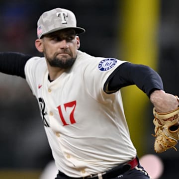 May 16, 2025; Arlington, Texas, USA; Texas Rangers starting pitcher Nathan Eovaldi (17) pitches against the Houston Astros during the first inning at Globe Life Field.