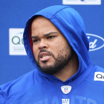 Jul 25, 2024; East Rutherford, NY, USA; New York Giants offensive guard Jermaine Eluemunor (72) gives an interview after training camp at Quest Diagnostics Training Center. 