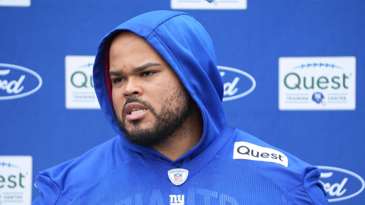 Jul 25, 2024; East Rutherford, NY, USA; New York Giants offensive guard Jermaine Eluemunor (72) gives an interview after training camp at Quest Diagnostics Training Center. 