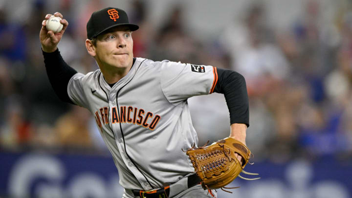 Jun 8, 2024; Arlington, Texas, USA; San Francisco Giants starting pitcher Spencer Howard (56) throws out Texas Rangers center fielder Leody Taveras (not pictured) at first base during the fifth inning at Globe Life Field. 