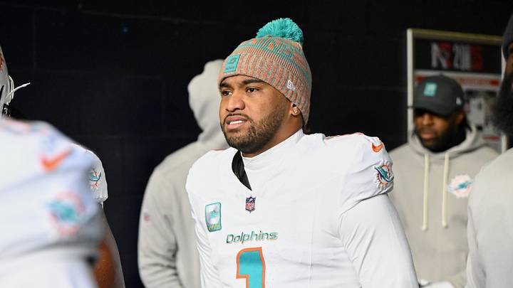 Jan 4, 2026; Foxborough, Massachusetts, USA; Miami Dolphins quarterback Tua Tagovailoa (1) walks out of the player tunnel before the game against the New England Patriots at Gillette Stadium. Mandatory Credit: Brian Fluharty-Imagn Images