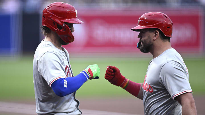 Apr 26, 2024; San Diego, California, USA; Philadelphia Phillies designated hitter Kyle Schwarber (12) is congratulated by first baseman Bryce Harper (3) after hitting a home run against the San Diego Padres during the first inning at Petco Park