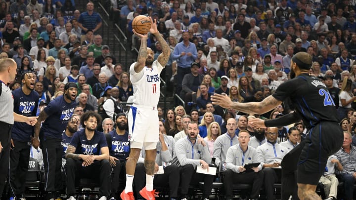 May 3, 2024; Dallas, Texas, USA; LA Clippers forward P.J. Tucker (17) makes a three point shot against the Dallas Mavericks during the first quarter during game six of the first round for the 2024 NBA playoffs at American Airlines Center. 