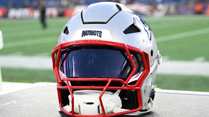 Nov 17, 2024; Foxborough, Massachusetts, USA; A New England Patriots helmet sit on an equipment case after a game against the Los Angeles Rams at Gillette Stadium. Mandatory Credit: Eric Canha-Imagn Images