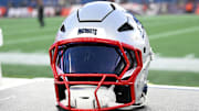 Nov 17, 2024; Foxborough, Massachusetts, USA; A New England Patriots helmet sit on an equipment case after a game against the Los Angeles Rams at Gillette Stadium. Mandatory Credit: Eric Canha-Imagn Images