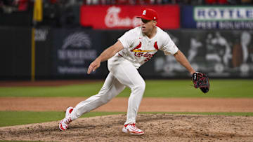 Mar 27, 2025; St. Louis, Missouri, USA;  St. Louis Cardinals relief pitcher Ryan Helsley (56) pitches against the Minnesota Twins during the ninth inning at Busch Stadium. Mandatory Credit: Jeff Curry-Imagn Images