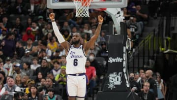 Los Angeles Lakers forward LeBron James (6) raises his arms.