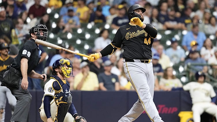 Jul 9, 2024; Milwaukee, Wisconsin, USA;  Pittsburgh Pirates first baseman Rowdy Tellez (44) hits a home run during the seventh inning against the Milwaukee Brewers at American Family Field. Mandatory Credit: Jeff Hanisch-USA TODAY Sports