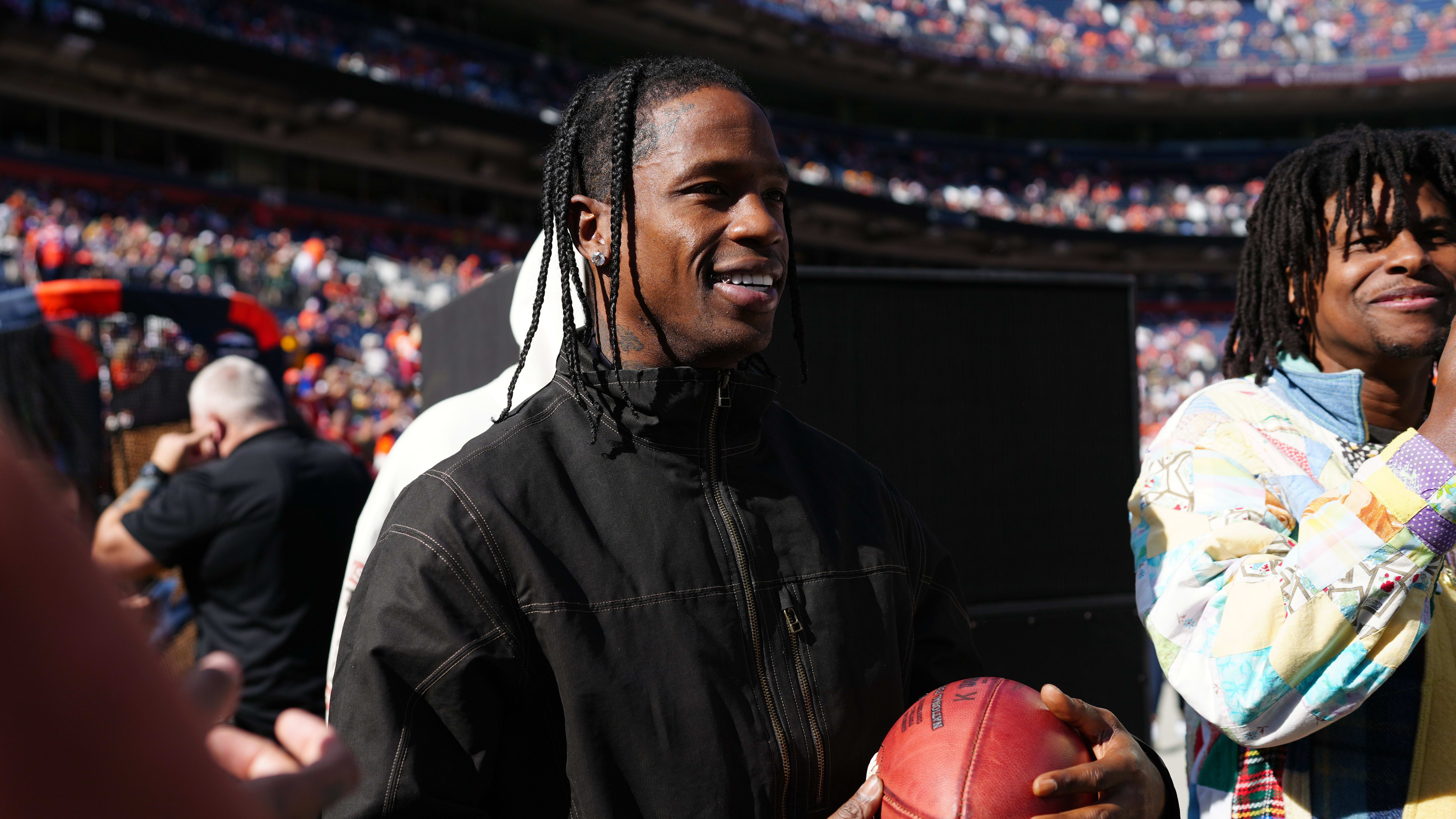 Oct 22, 2023; Denver, Colorado, USA; American songwriter Travis Scott before the game between the Green Bay Packers and Denver Broncos.