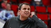 Dec 6, 2025; Raleigh, North Carolina, USA; NC State Wolfpack head coach Will Wade reacts during the first half of the game against the Liberty Flames at the Lenovo Center. Mandatory Credit: Jaylynn Nash-Imagn Images