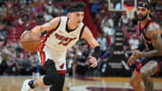 Apr 14, 2024; Miami, Florida, USA;  Miami Heat guard Tyler Herro (14) drives to the basket against