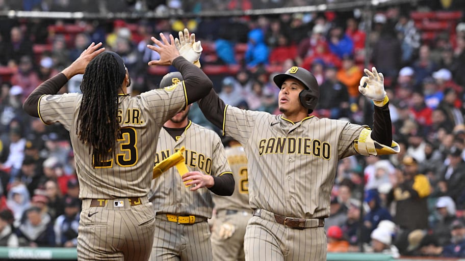 San Diego Padres third baseman Manny Machado celebrates a home run with Fernando Tatis Jr.