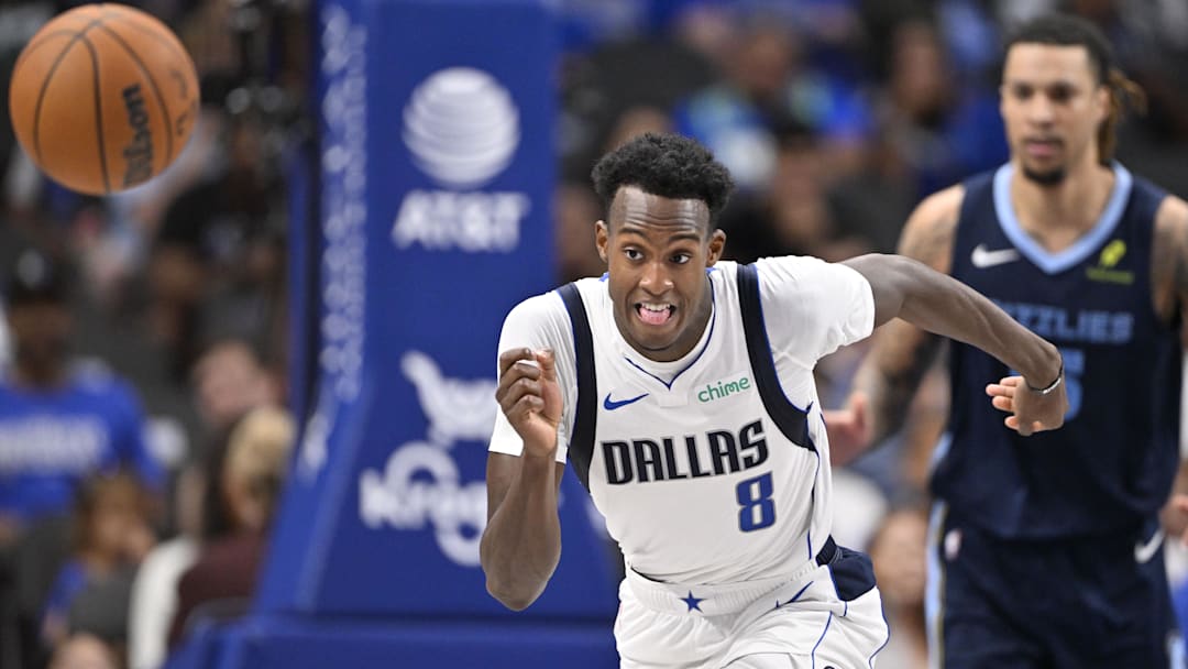 Oct 7, 2024; Dallas, Texas, USA; Dallas Mavericks forward Olivier-Maxence Prosper (8) chases the ball during the second quarter against the Memphis Grizzlies at the American Airlines Center. Mandatory Credit: Jerome Miron-Imagn Images