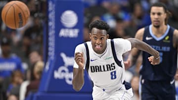 Oct 7, 2024; Dallas, Texas, USA; Dallas Mavericks forward Olivier-Maxence Prosper (8) chases the ball during the second quarter against the Memphis Grizzlies at the American Airlines Center. Mandatory Credit: Jerome Miron-Imagn Images