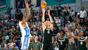 Michigan State Spartans forward Jaxon Kohler (0) shoots a three point basket during the second half of the Fort Myers Tip-Off Beach Division game against the North Carolina Tar Heels at Suncoast Credit Union Arena on Fort Myers, Fla., on Thursday, Nov. 27, 2025.