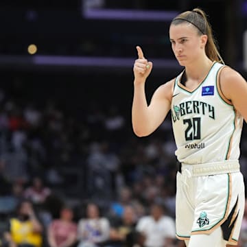 Aug 28, 2024; Los Angeles, California, USA; New York Liberty guard Sabrina Ionescu (20) gestures against the LA Sparks in the first half at Crypto.com Arena. Mandatory Credit: Kirby Lee-USA TODAY Sports