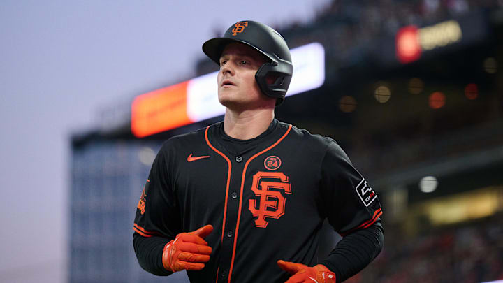 San Francisco Giants infielder Matt Chapman runs to the dugout after scoring a run against the Miami Marlins during the sixth inning at Oracle Park on Aug 31.