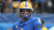 Nov 15, 2025; Pittsburgh, Pennsylvania, USA;  Pittsburgh Panthers quarterback Mason Heintschel (6) warms up against the Notre Dame Fighting Irish at Acrisure Stadium. Mandatory Credit: Charles LeClaire-Imagn Images
