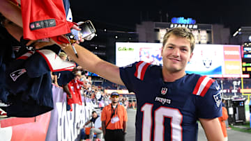 Aug 8, 2025; Foxborough, Massachusetts, USA; New England Patriots quarterback Drake Maye (10) signs autographs after a game against the Washington Commanders during the second half at Gillette Stadium. Mandatory Credit: Brian Fluharty-Imagn Images