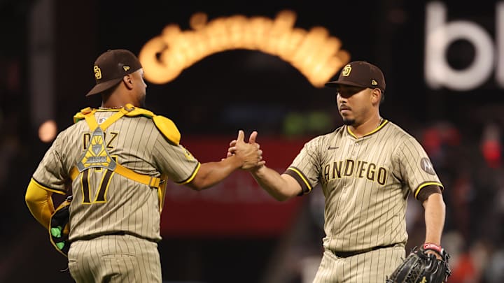Jun 3, 2025; San Francisco, California, USA; San Diego Padres relief pitcher Jeremiah Estrada (56) celebrates with catcher Elias Diaz (17) after the game against the San Francisco Giants at Oracle Park. Mandatory Credit: Kelley L Cox-Imagn Images Jun 3, 2025; San Francisco, California, USA; San Diego Padres relief pitcher Jeremiah Estrada (56) celebrates with catcher Elias Diaz (17) after the game against the San Francisco Giants at Oracle Park. Mandatory Credit: Kelley L Cox-Imagn Images