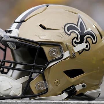 Sep 24, 2023; Green Bay, Wisconsin, USA;  An New Orleans Saints helmet during warmups prior to the game against the Green Bay Packers at Lambeau Field. Mandatory Credit: Jeff Hanisch-Imagn Images