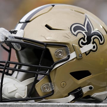 Sep 24, 2023; Green Bay, Wisconsin, USA;  An New Orleans Saints helmet during warmups prior to the game against the Green Bay Packers at Lambeau Field. Mandatory Credit: Jeff Hanisch-Imagn Images