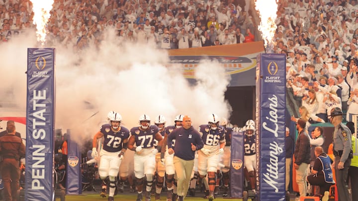 Penn State Nittany Lions head coach James Franklin leads the team out before the game against the Notre Dame Fighting Irish in the Orange Bowl at Hard Rock Stadium. Penn State Nittany Lions head coach James Franklin leads the team out before the game against the Notre Dame Fighting Irish in the Orange Bowl at Hard Rock Stadium.