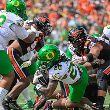 Sep 14, 2024; Corvallis, Oregon, USA; Oregon Ducks running back Jordan James (20) scores.a touchdown during the first quarter against the Oregon State Beavers at Reser Stadium. Mandatory Credit: Craig Strobeck-Imagn Images