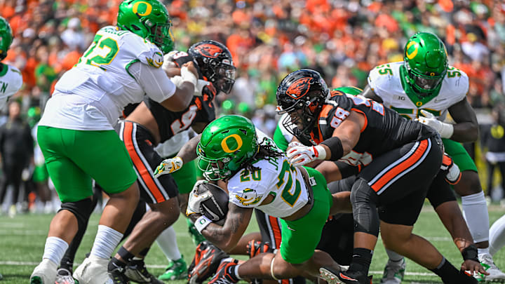 Sep 14, 2024; Corvallis, Oregon, USA; Oregon Ducks running back Jordan James (20) scores.a touchdown during the first quarter against the Oregon State Beavers at Reser Stadium. Mandatory Credit: Craig Strobeck-Imagn Images