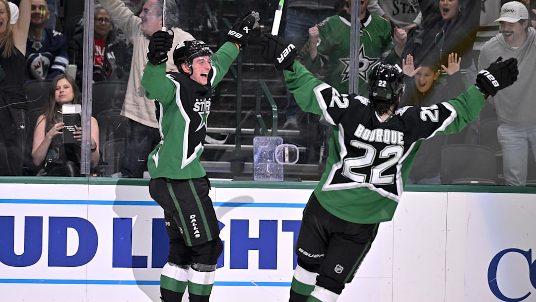 Feb 2, 2026; Dallas, Texas, USA; Dallas Stars defenseman Thomas Harley (55) and center Mavrik Bourque (22) celebrate after Harley scores the game winning goal the Winnipeg Jets during the overtime period at the American Airlines Center. Mandatory Credit: Jerome Miron-Imagn Images