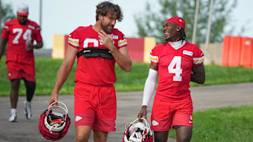 Jul 22, 2025; St. Joseph, MO, USA; Kansas City Chiefs tight end Travis Kelce (87) and wide receiver Rashee Rice (4) walk down the hill to the fields prior to training camp at Missouri Western State University. Mandatory Credit: Denny Medley-Imagn Images