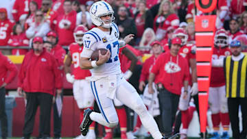 Nov 23, 2025; Kansas City, Missouri, USA; Indianapolis Colts quarterback Daniel Jones (17) runs against the Kansas City Chiefs in the second half at GEHA Field at Arrowhead Stadium. Mandatory Credit: Denny Medley-Imagn Images