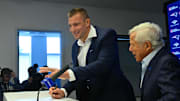 Nov 12, 2025; Foxborough, MA, USA; New England Patriots former player Rob Gronkowski signs a ceremonial one day contract to retire a Patriot at Gillette Stadium. Mandatory Credit: Eric Canha-Imagn Images