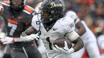 Oct 11, 2025; Corvallis, Oregon, USA; Wake Forest Demon Deacons running back Demond Claiborne (1) runs the ball during the second half against the Oregon State Beavers at Reser Stadium.