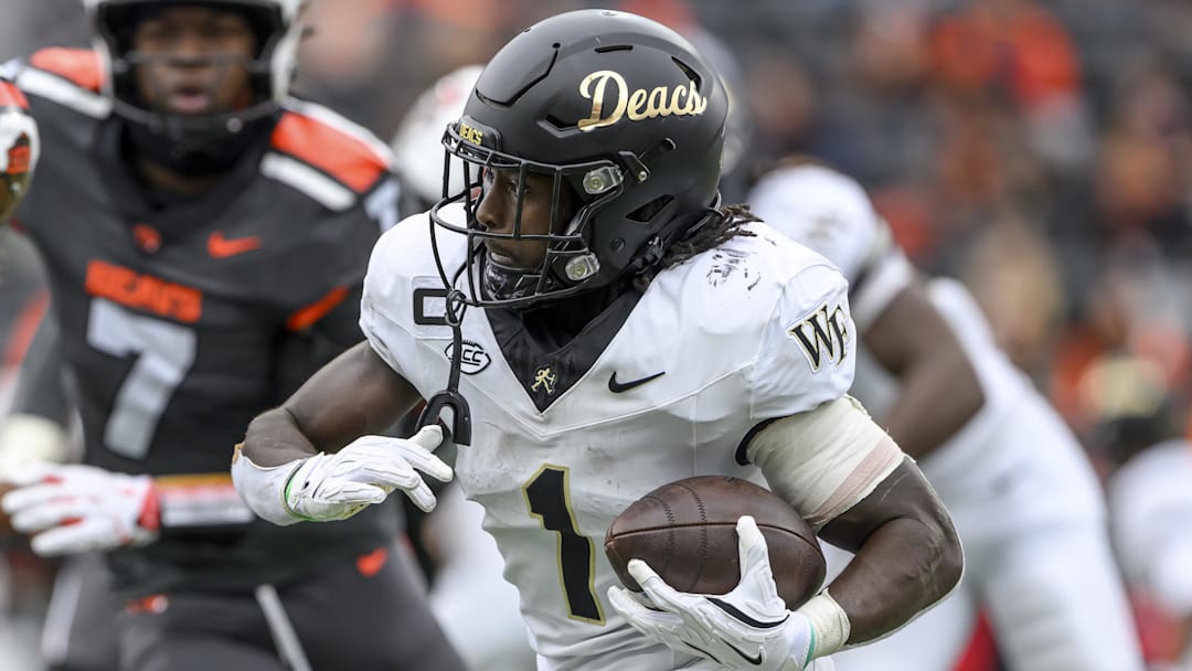 Oct 11, 2025; Corvallis, Oregon, USA; Wake Forest Demon Deacons running back Demond Claiborne (1) runs the ball during the second half against the Oregon State Beavers at Reser Stadium. Mandatory Credit: Craig Strobeck-Imagn Images