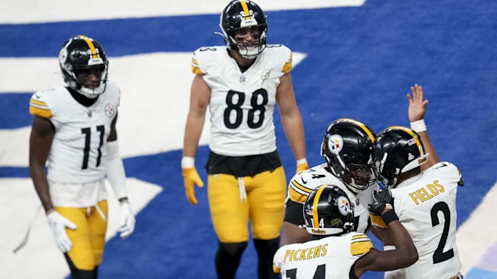 Sep 29, 2024; Indianapolis, Indiana, USA;  Pittsburgh Steelers quarterback Justin Fields (2) celebrates with his teammates after scoring a touchdown Sunday, Sept. 29, 2024, during a game against the Indianapolis Colts at Lucas Oil Stadium. Mandatory Credit: Grace Smith-USA TODAY Network via Imagn Images