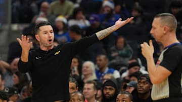 Dec 25, 2024; San Francisco, California, USA; Los Angeles Lakers head coach JJ Redick (left) argues with referee Justin Van Duyne (right) during the fourth quarter against the Golden State Warriors at Chase Center. Mandatory Credit: Darren Yamashita-Imagn Images