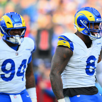 Nov 3, 2024; Seattle, Washington, USA; Los Angeles Rams linebacker Jared Verse (8) celebrates after sacking Seattle Seahawks quarterback Geno Smith (7) (not pictured) during the first half at Lumen Field. Mandatory Credit: Steven Bisig-Imagn Images