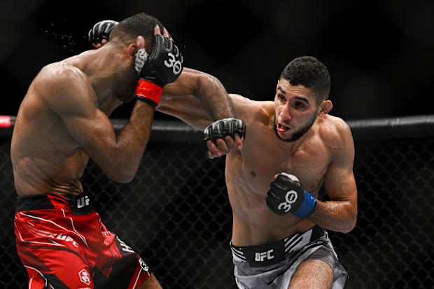 Jai Herbert (red gloves) fights Fares Ziam (blue gloves) during UFC Fight Night at O2 Arena. 