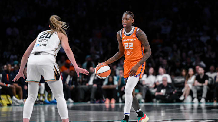 Aug 25, 2025; Brooklyn, New York, USA; Connecticut Sun guard Saniya Rivers (22) sets the play while defended by New York Liberty guard Sabrina Ionescu (20) during the second half at Barclays Center. 