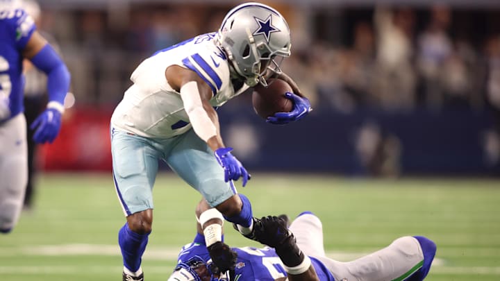 Nov 30, 2023; Arlington, Texas, USA; Seattle Seahawks safety Jamal Adams (33) tackles Dallas Cowboys wide receiver Brandin Cooks (3) during the first half at AT&T Stadium. Mandatory Credit: Tim Heitman-Imagn Images