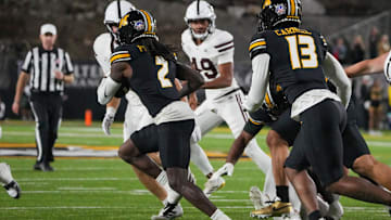 Missouri Tigers cornerback Toriano Pride Jr. (2) recovers a fumble, in a game against the Mississippi State Bulldogs this season.