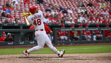 Apr 2, 2025; St. Louis, Missouri, USA;  St. Louis Cardinals catcher Ivan Herrera (48) hits a two run home run for his second home run of the game against the Los Angeles Angels during the sixth inning at Busch Stadium. Mandatory Credit: Jeff Curry-Imagn Images