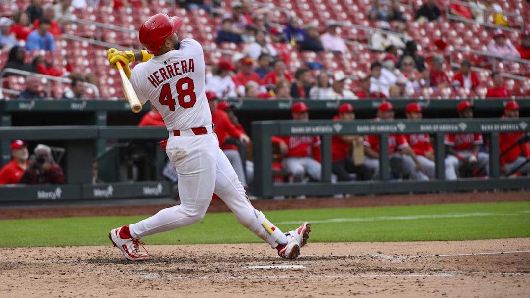 Apr 2, 2025; St. Louis, Missouri, USA;  St. Louis Cardinals catcher Ivan Herrera (48) hits a two run home run for his second home run of the game against the Los Angeles Angels during the sixth inning at Busch Stadium. Mandatory Credit: Jeff Curry-Imagn Images
