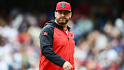 May 28, 2025; Cleveland, Ohio, USA; Cleveland Guardians manager Stephen Vogt (12) walks back to the dugout during the seventh inning against the Los Angeles Dodgers at Progressive Field. Mandatory Credit: Ken Blaze-Imagn Images