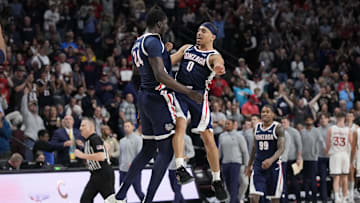 Gonzaga Bulldogs center Ismaila Diagne (24) and guard Ryan Nembhard (0) celebrate against the Saint Mary's Gaels during the second half in the final of the West Coast Conference tournament at Orleans Arena