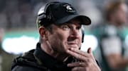 Nov 15, 2025; East Lansing, Michigan, USA; Michigan State head coach Jonathan Smith watches his team play against Penn State from the sidelines in the third quarter at Spartan Stadium.